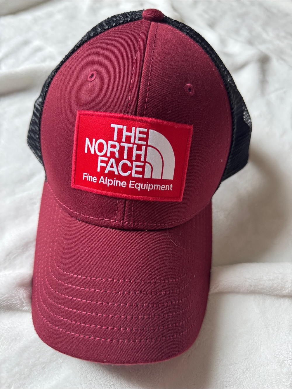 The North Face Burgundy and Black Mesh Logo Trucker Cap